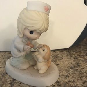 Precious moments nurse and puppy